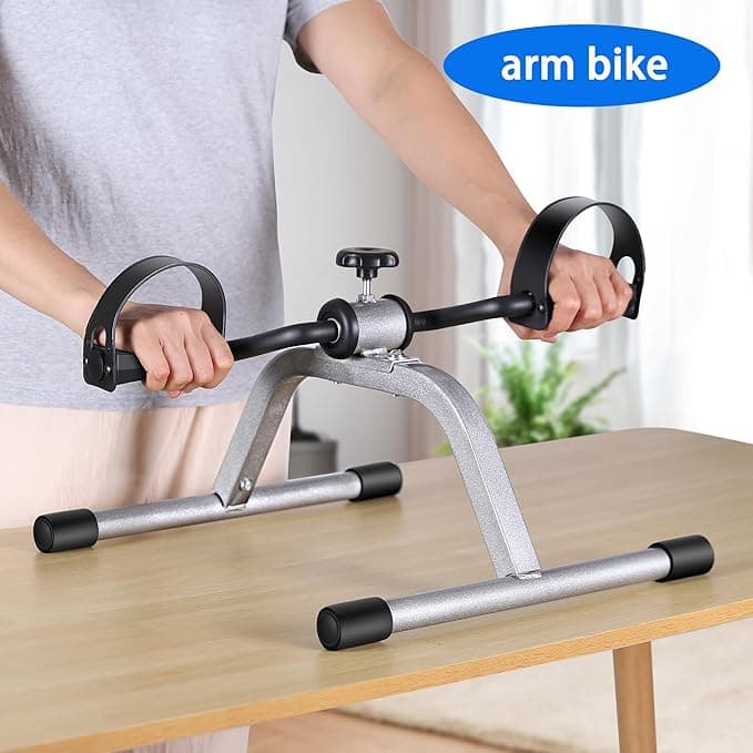 Arm pedal exerciser used as an arm bike on a table